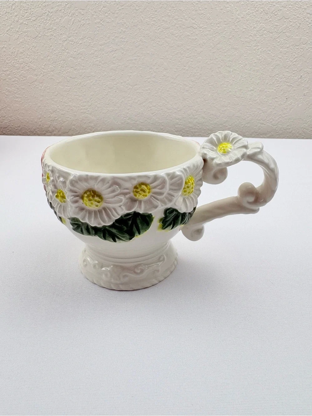 White Teacup & Saucer Featuring Ceramic Base, Raised White Daisies & Pink Roses